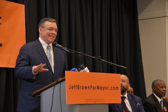 Mayoral candidate Jeff Brown in front of a podium