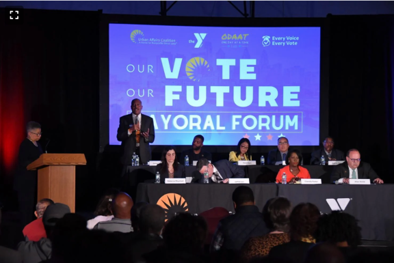 Audience and mayoral candidates at Vote Future Mayoral Forum