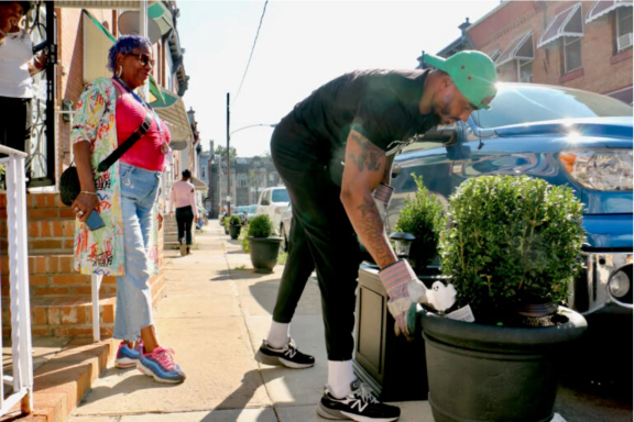 Gary Hill delivers planters on Taylor Street in North Philadelphia