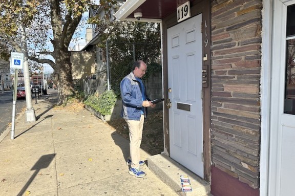 Ken Weinstein knocks on the door of someone who’s mail-in ballot was rejected because of an error.
