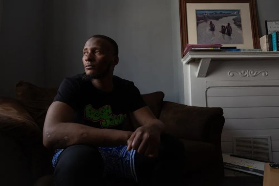 Aziz poses for a portrait at the recovery home where he lives in South Philadelphia on June 4, 2025. (Photo by Solmaira Valerio)