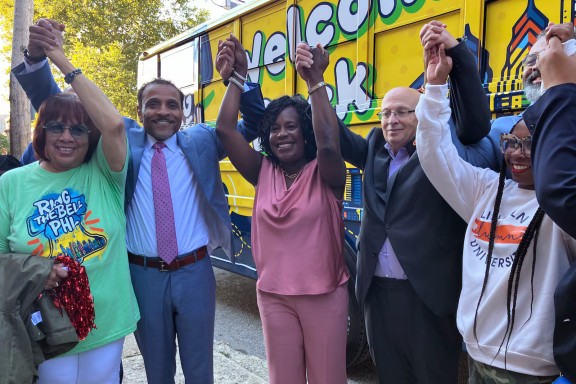 Philadelphia Superintendent Tony Watlington, second from left, Mayor Cherelle Parker, and Philadelphia Federation of Teachers President Arthur Steinberg stand along others on the first day of school on Monday, Aug. 25, 2025 (Carly Sitrin / Chalkbeat)