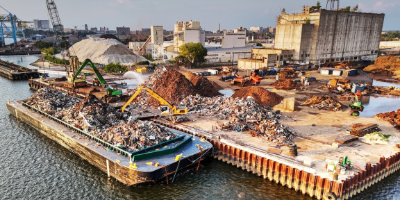 Aerial View of a Trash Barge and Junk Yard along Delaware River (Getty)