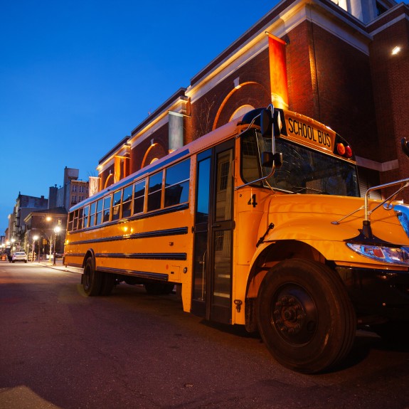 School bus at evening on the streets of Philadelphia downtown