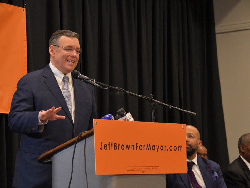 Mayoral candidate Jeff Brown in front of a podium