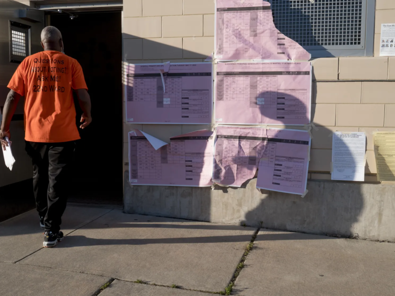 volunteer at polling place in the East Mount Airy neighborhood