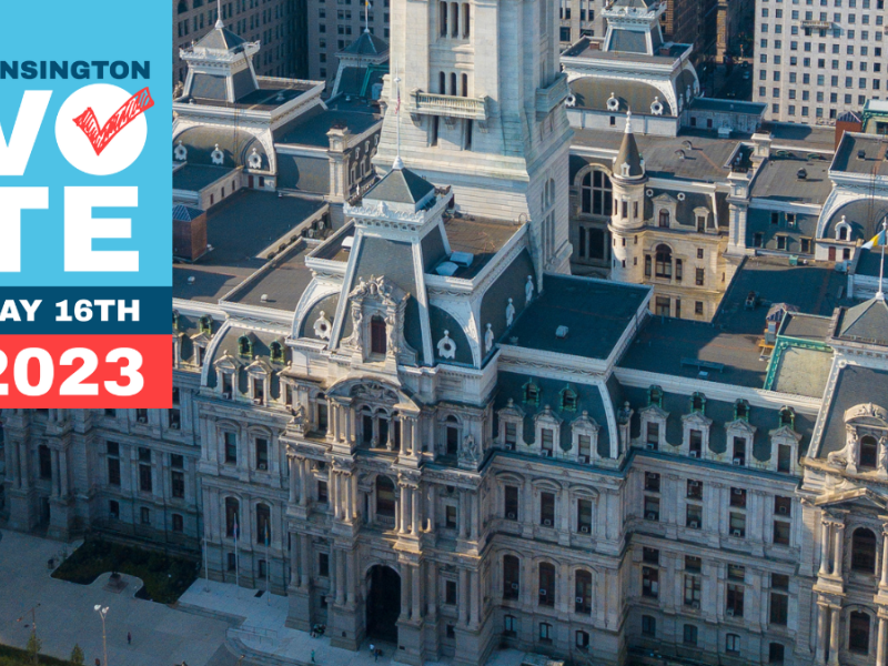 Aerial shot of city hall overlaid with a Vote graphic