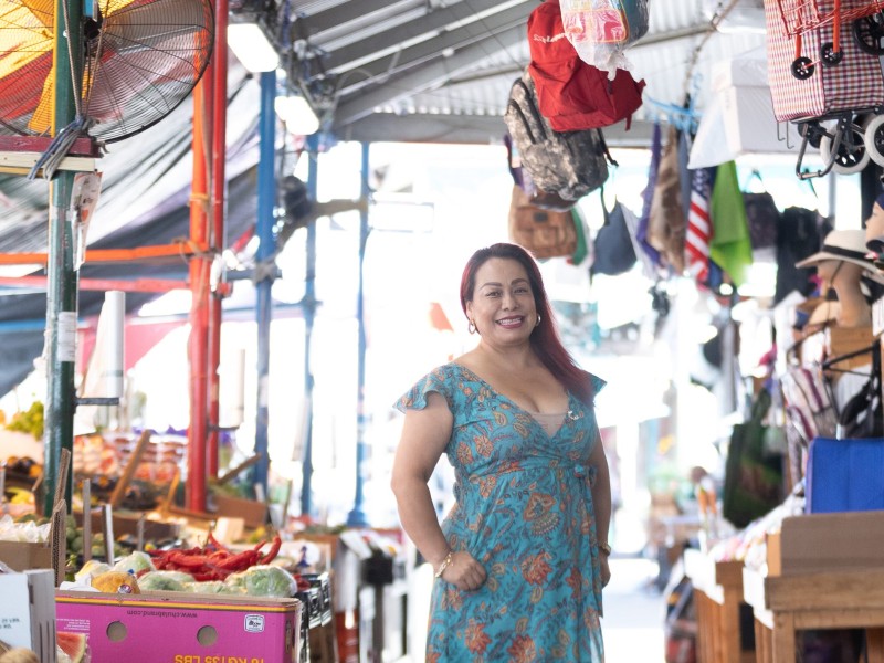 Woman standing in a South Philadelphia open air market