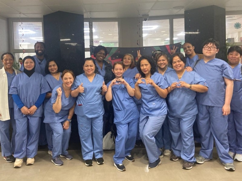 Photo of immigrants who have become certified nursing assistants and home health aids