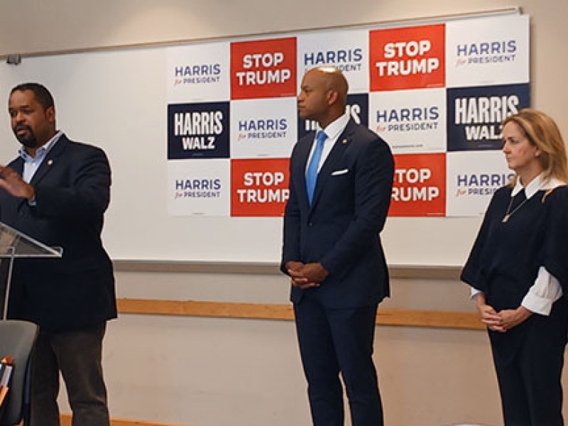 State-Senator-and-chair-of-the-Pennsylvania-Democratic-Party-Sharif-Street-pictured-left-speaks-while-Gov.-Wes-Moore-and-Rep.-Madeline-Dean-look-on