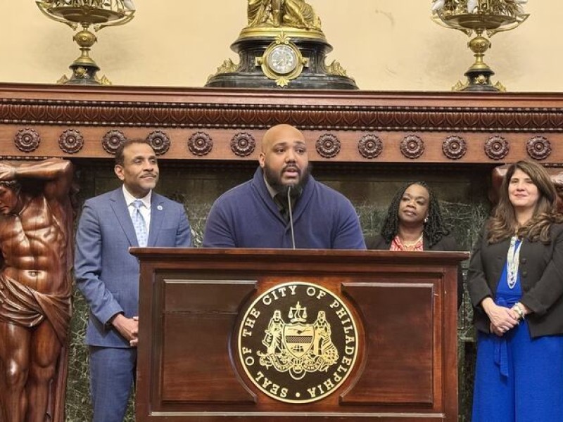 atim Byrd (center), a teacher at Strawberry Mansion High School, discusses citywide efforts to attract and retain more teachers and teachers of color in Philadelphia. Kristen A. Graham / Staff