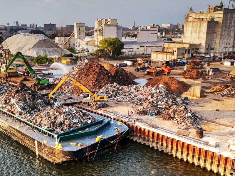 Aerial View of a Trash Barge and Junk Yard along Delaware River (Getty)