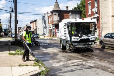 Philadelphia’s Streets Department demonstrated their mechanical street and sidewalk sweepers at 30th and Gordon streets on Aug. 2, 2021. (Kimberly Paynter/WHYY)