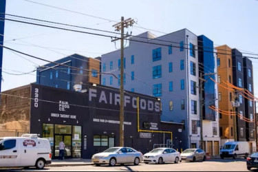 Buildings, including a food store and a new apartment property, on the 3300 Block of Fairmont Ave in Philadelphia