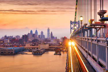 Philadelphia, Pennsylvania, USA downtown skyline from the Benjamin Franklin Bridge.