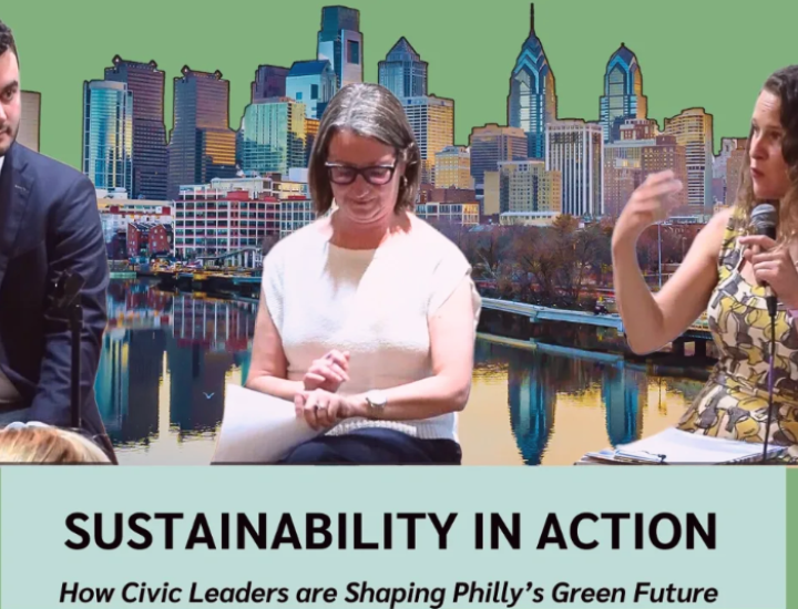 Three panelists in front of a picture of Philadelphia skyline