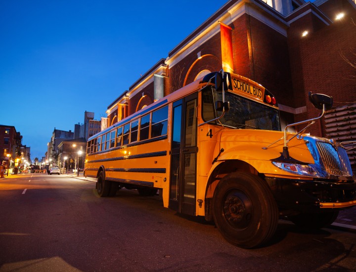 School bus at evening on the streets of Philadelphia downtown